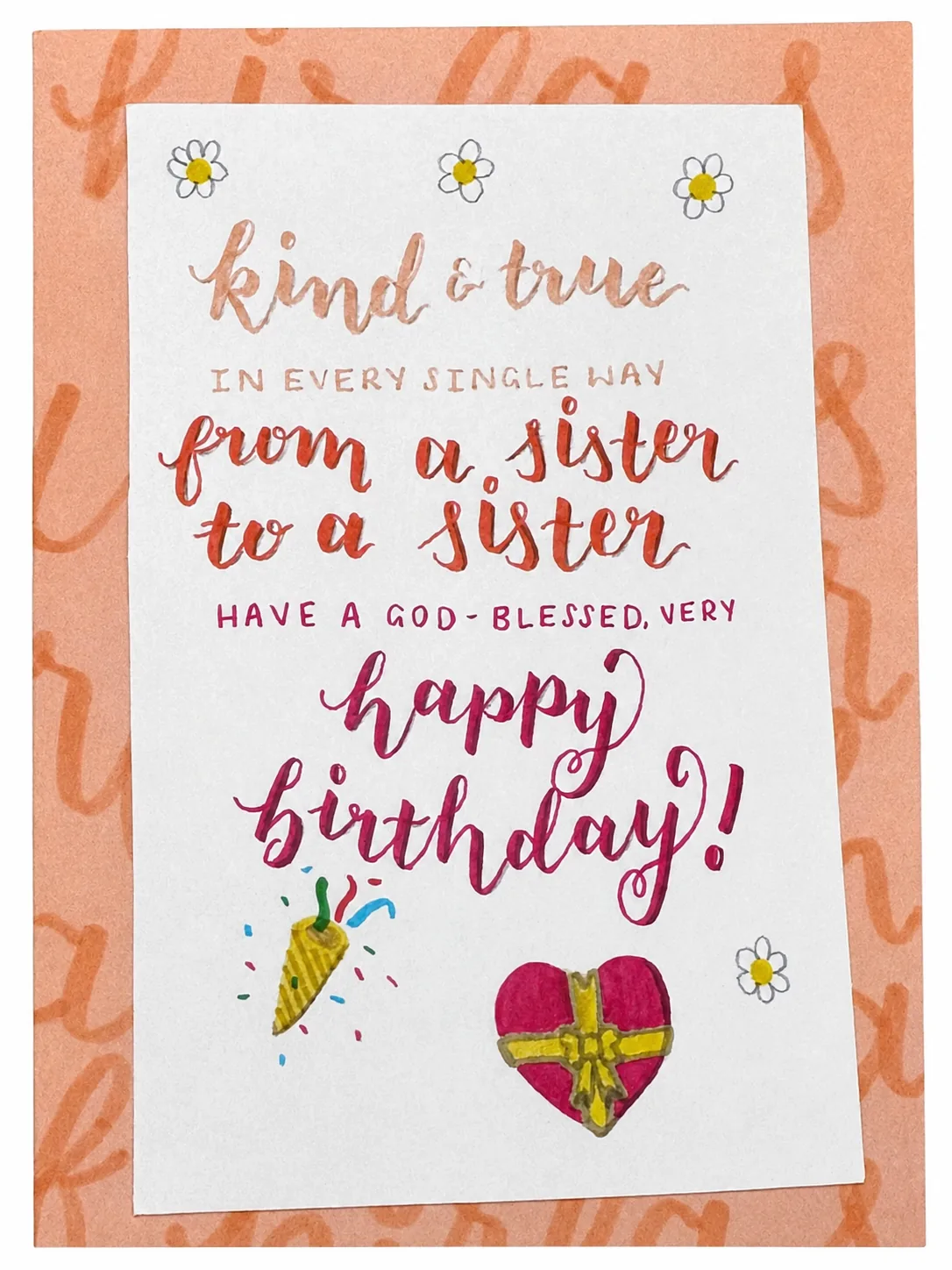 Birthday card lettered 'kind & true in every single way, from a sister to a sister, have a God-blessed very happy birthday!' shading from peach to deep pink, with daisies, a party popper and a wrapped heart.